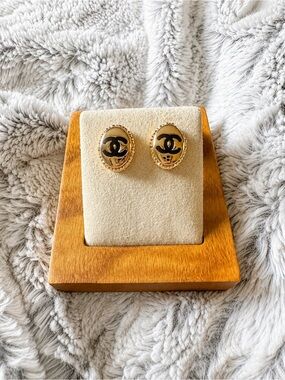 CHANEL Gold and Black Oval Logo Clip-On Earrings